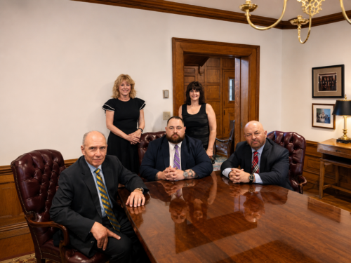 Attorneys and staff of Aloise & Wilcox in their Worcester office